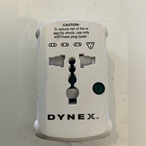 Dynex Travel electric adapter for traveling aboard